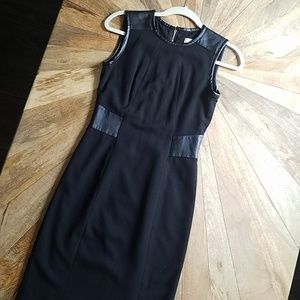 Black dress with faux leather accents
